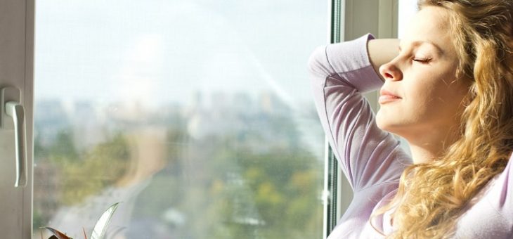 woman breathing fresh air